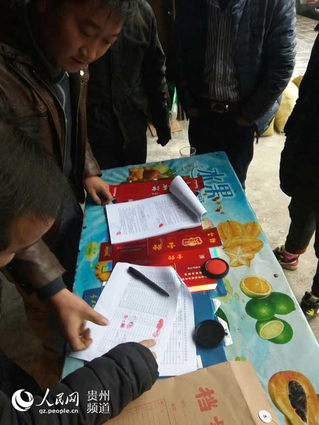 明硐社区:第一批借粮30吨已全部发放到户