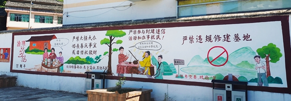 图为：辖区文化广场部分墙体喷画