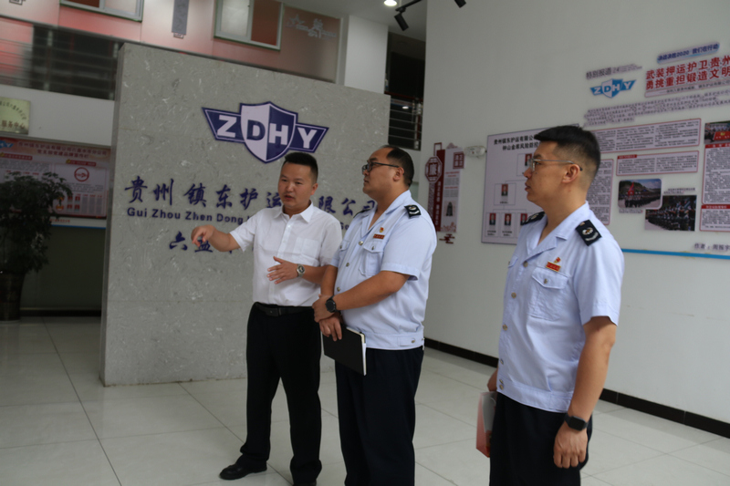 了解企业经营发展情况及招录退役军人情况。徐剑摄