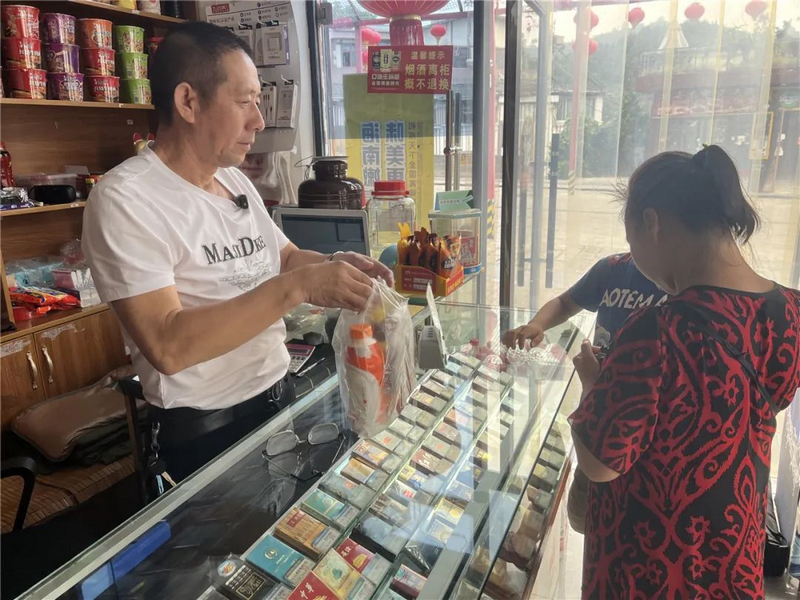 汪中华的便利店。吴承攀摄