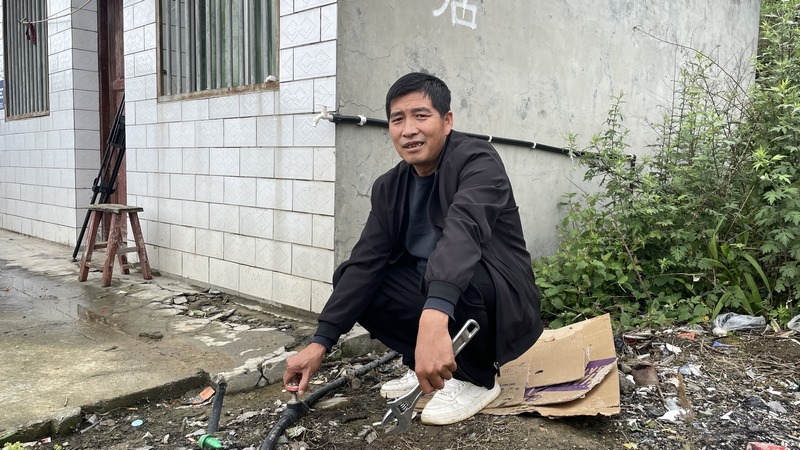 图为管水员张德芳 摄影廖祝梅.jpg