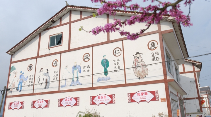 西洛街道開化社區“德禮誠仁廉” 文化牆。胡鳳至 攝.jpg