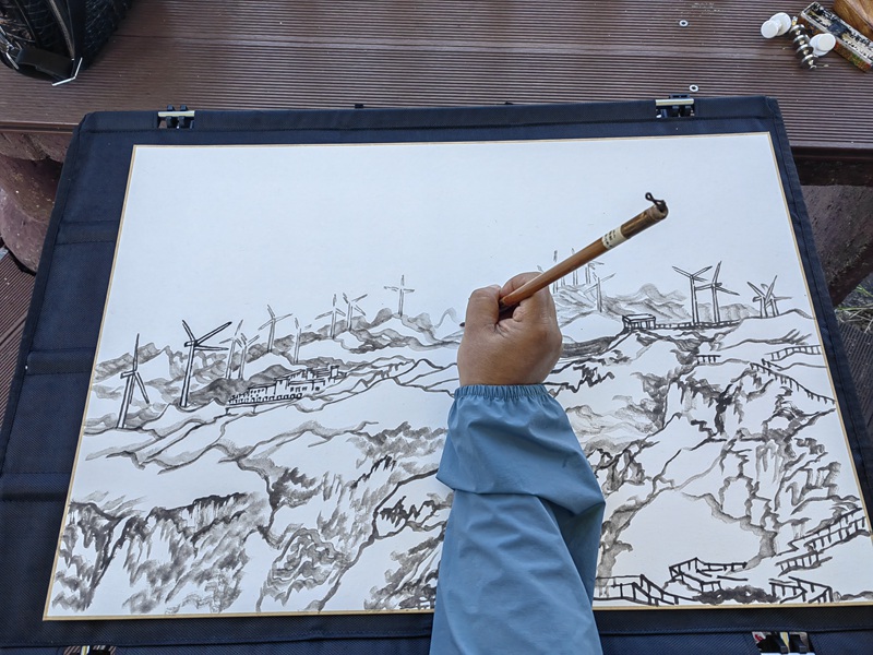 著名画家王乘写生画作赫章县大韭菜坪。王永胜摄