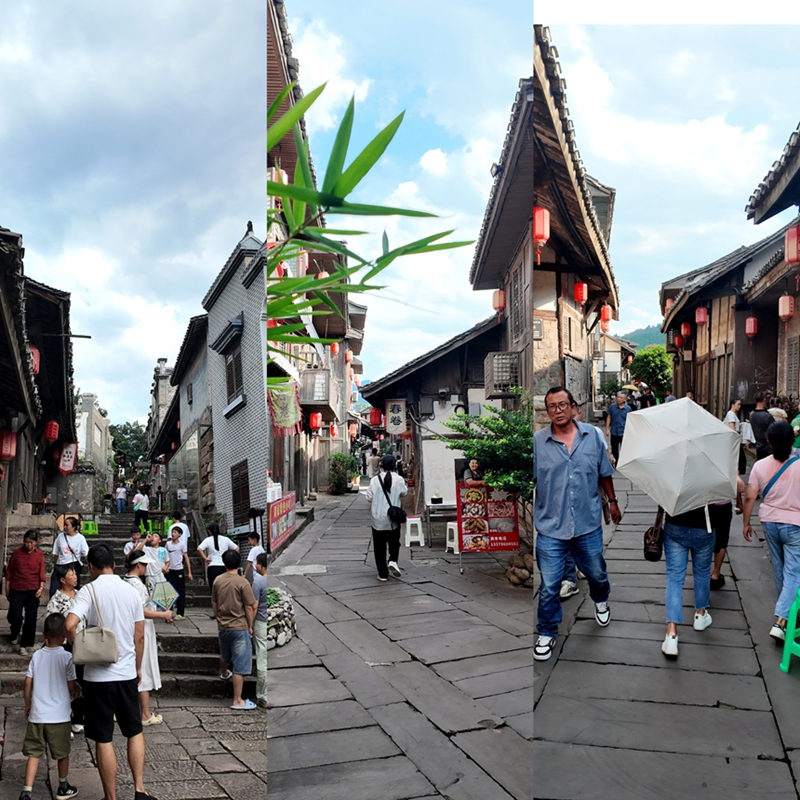 來自四川、重慶等地的游客,漫步古鎮,享受假日時光。姚瑤 攝.jpg