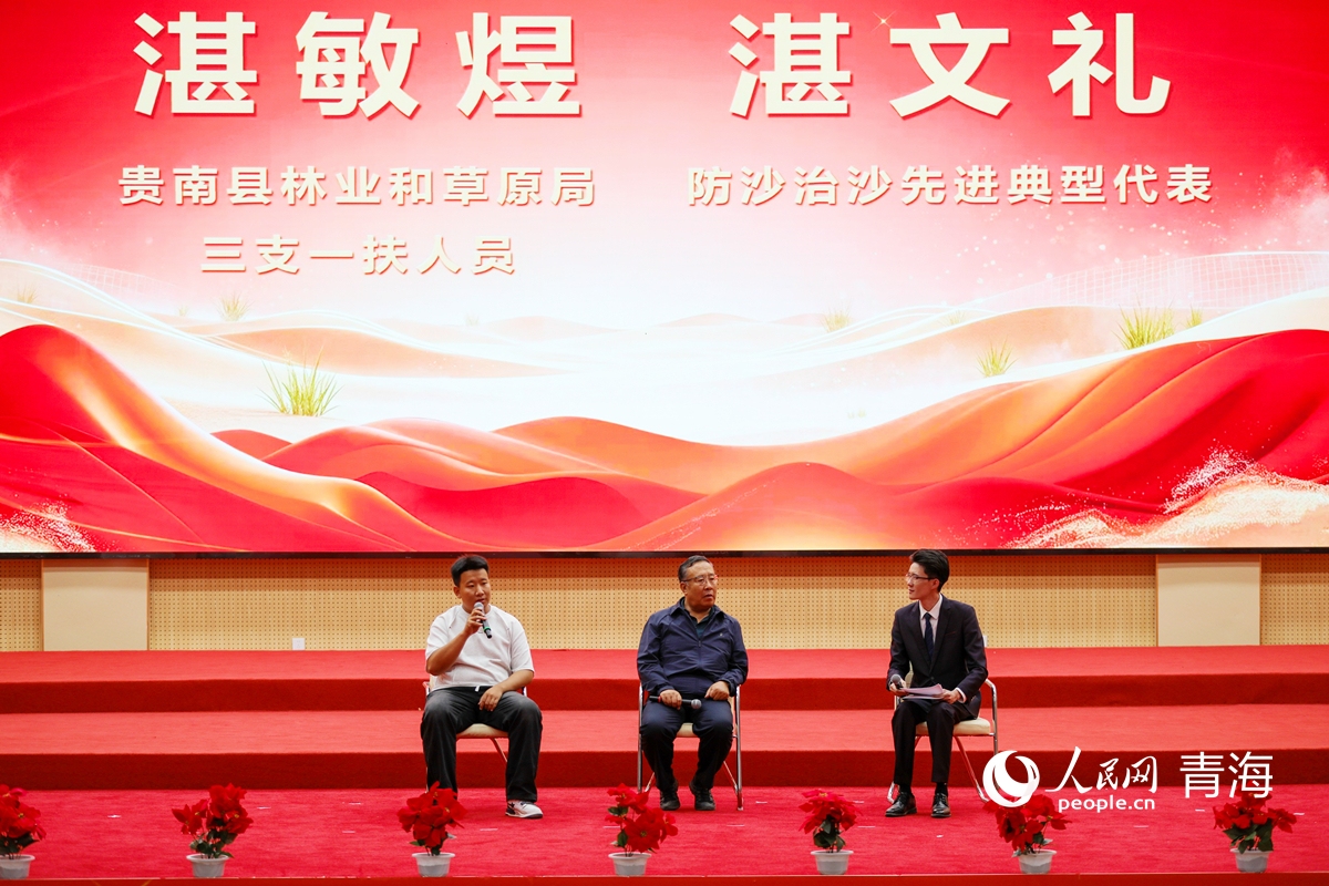 湛文礼父子分享。人民网记者 杨启红摄